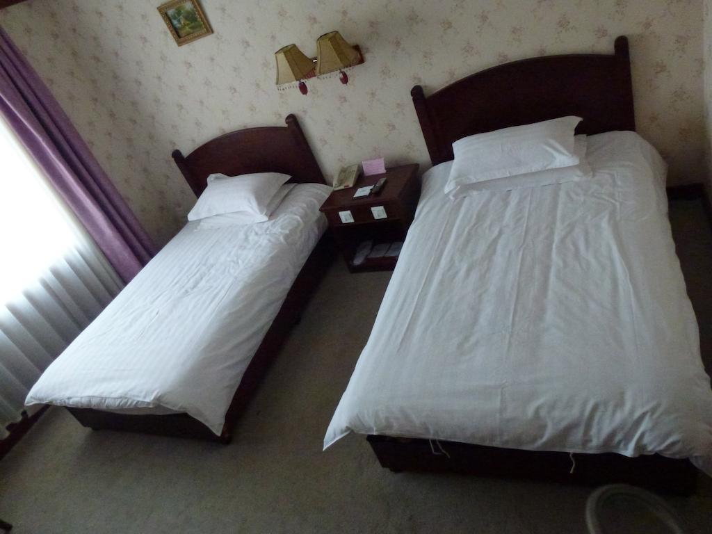 Harbin Volgamanor Otel Acheng Oda fotoğraf